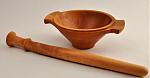 Pear porringer and matching spurtle.  Carved handles and ring detail.  Spurtle warped before finishing and has slightly off-axis knob