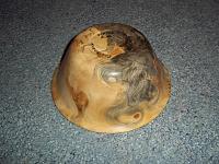 100 0121 
 
Black spruce burl bowl that is about 5" od and 3" deep.  I was surprised at the different colors in this burl.