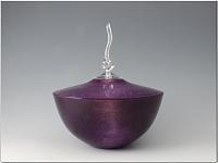 Purple Passion 
 
Maple with acrylic finial, 8  to top of finial x 8 diameter, finished in gloss poly.