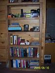 This book shelf has is made of solid oak.  The front and back have face frames so it can be used as a normal book shelf or a room divider.  My brother's girl friend wanted the books shelf and was her idea.  I just had to work out the details.