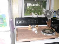 Stove top storage tray.