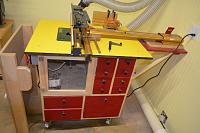 Router table with Incra 27" positioned.  With the two 4" dust connections this catches 99%.  Jointech Lift, Porter Cable Motor, Jointech...