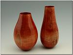 Desert Illusion 
 
Curly Maple set, RIT dye, gloss poly.  Vase on left is 7 5/8" high x 4 3/4" diameter x 1/8" thick; vase on right is 8 3/4" high x...