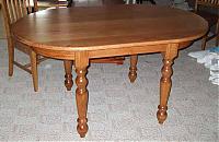 My first oval or rounded end kitchen table. I made my own veneer for the curved ends of the table to match the rest of the wood.